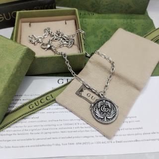 Gucci GG Engraved Medallion Pendant Necklace